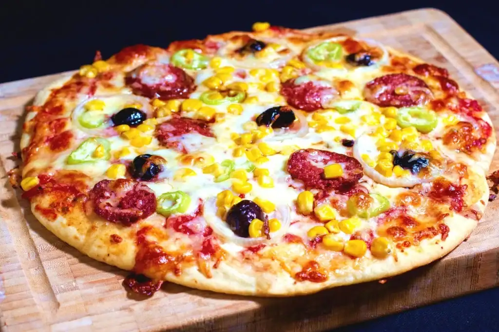 wie viel wiegt eine pizza
